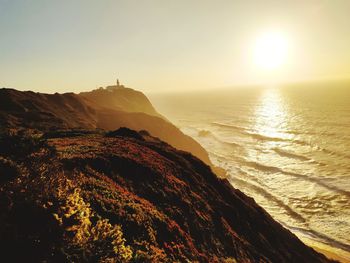 Scenic view of sea against sky during sunset