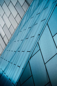 Full frame shot of modern glass building in city