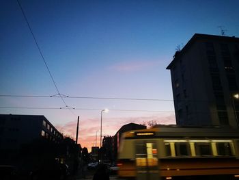 Silhouette of city against clear sky