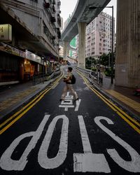 Man crossing road in city