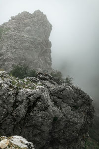 Rock formation on land against sky