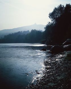 Scenic view of river against sky