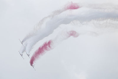 Low angle view of vapor trail against sky