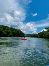 Scenic view of river against sky