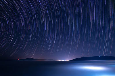 Scenic view of star field against sky at night