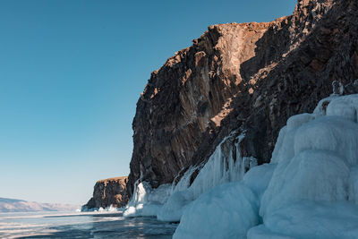 Panoramic view of frozen sea against clear sky during winter