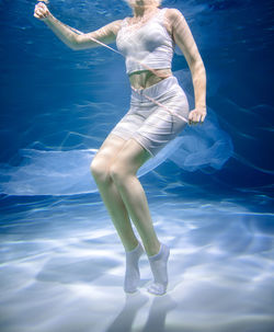 Woman swimming in pool