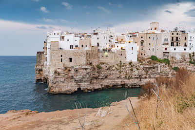 Polignano a mare. town on the cliffs, puglia region, italy, europe. traveling concept background 