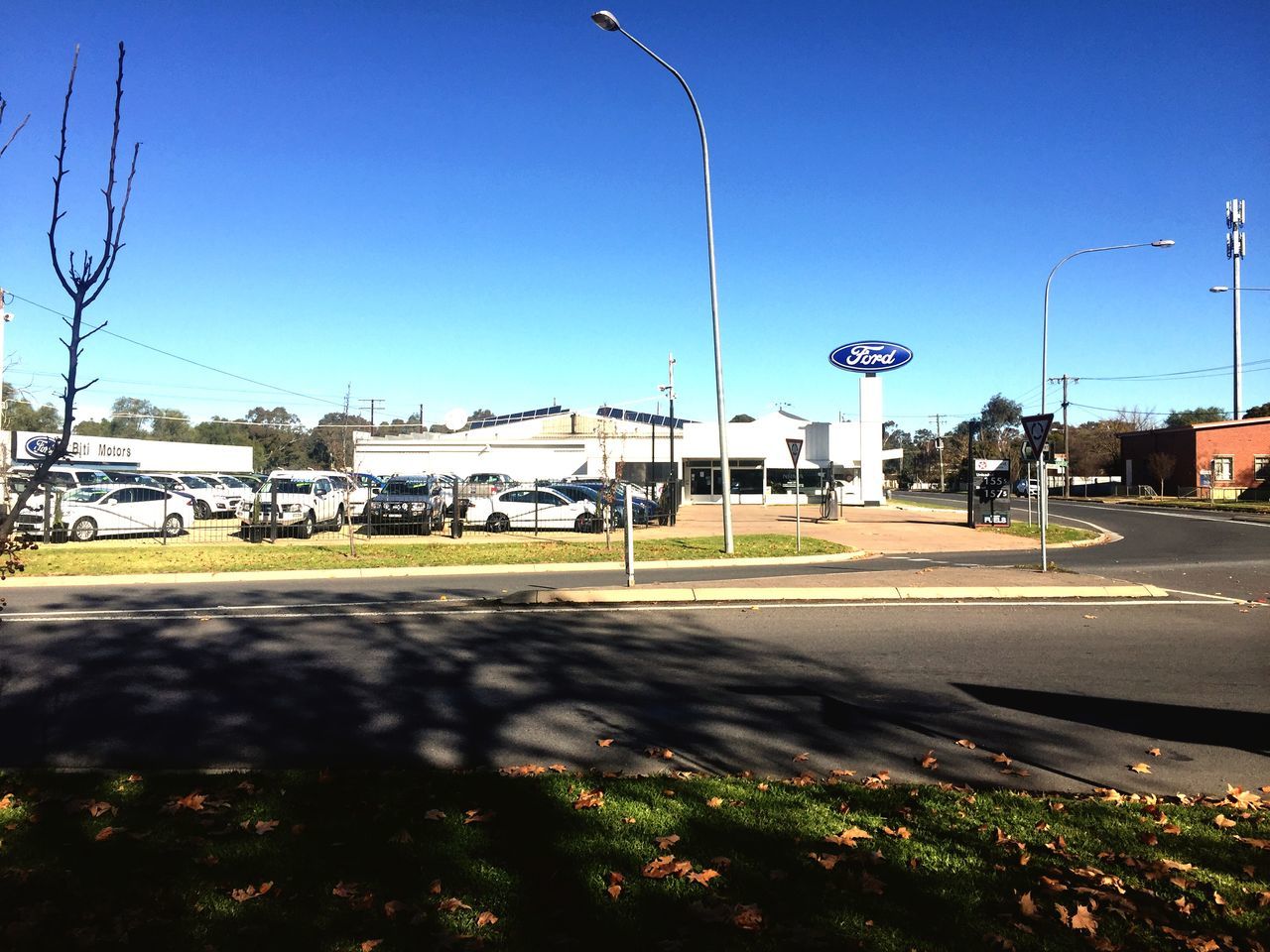 VIEW OF STREET AGAINST CLEAR SKY