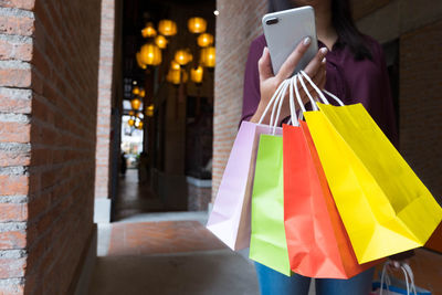 Woman holding mobile phone