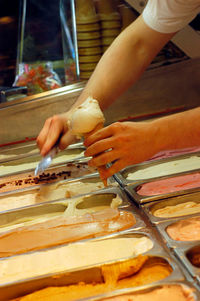 Close-up of person preparing food