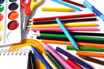 High angle view of multi colored pencils on table