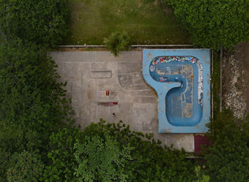 High angle view of graffiti on wall in city