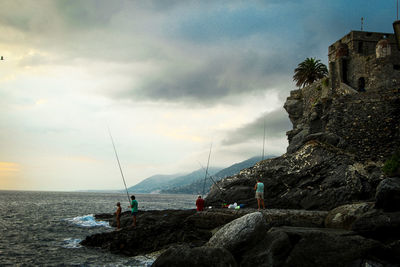 Scenic view of sea against cloudy sky