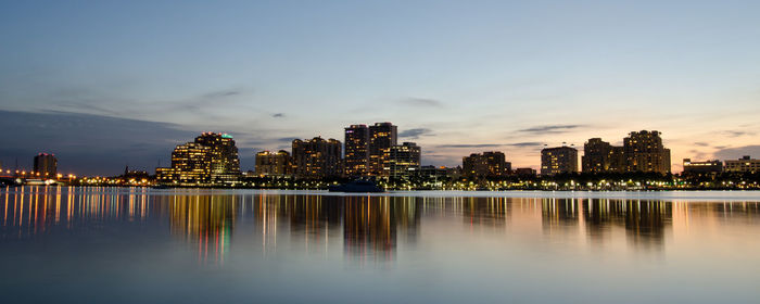 Reflection of city in water at night