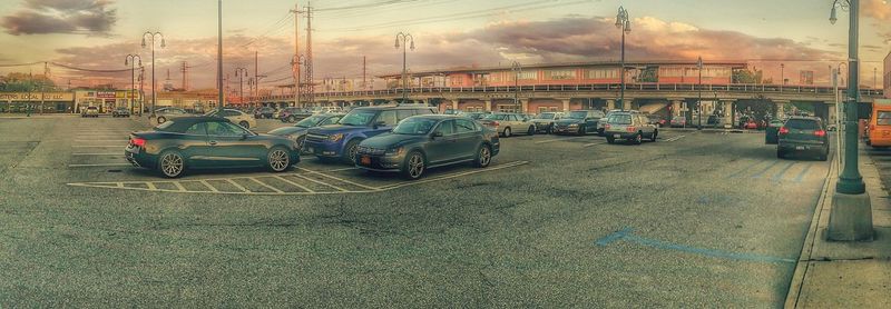 Cars on road against sky