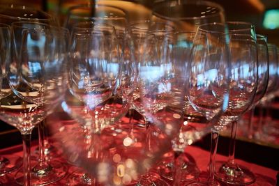 Close-up of wineglasses on table