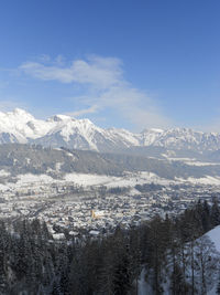 Scenic view of snowcapped mountains against sky
