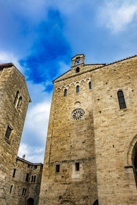 Low angle view of old building against sky