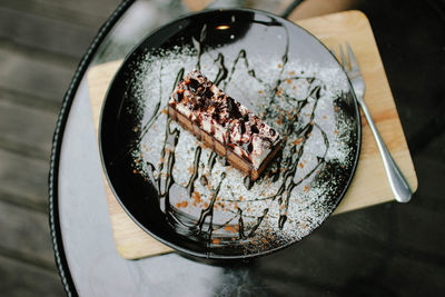 High angle view of cake in plate on table