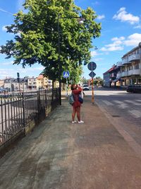 Full length of woman standing in park