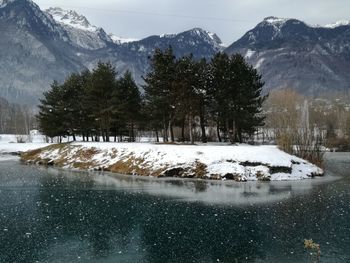 Scenic view of snow covered mountains