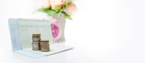 Close-up of coins on white background
