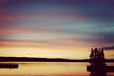 Scenic view of lake at sunset