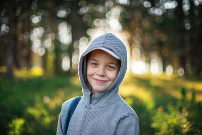 Portrait of smiling boy outdoors