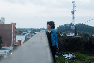 Beautiful woman on the roof