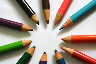 Close-up of colored pencils on table