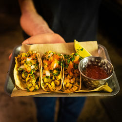 Cropped image of man preparing food