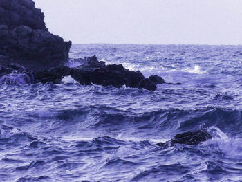 Scenic view of sea against clear sky