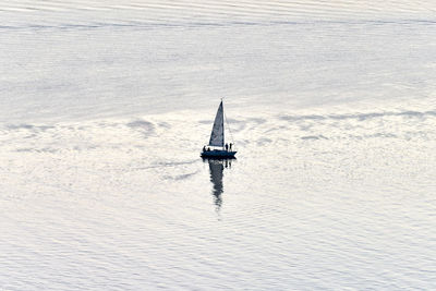 High angle view of sailboat sailing on sea