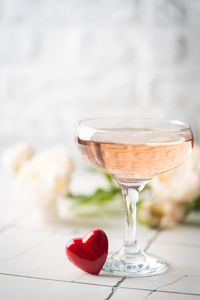 Close-up of wineglass on table