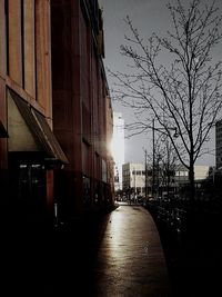 Road amidst buildings in city