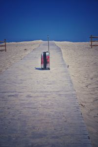 Scenic view of beach against clear sky