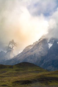 Scenic view of snowcapped mountains against sky