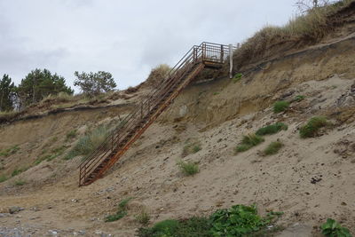 Low angle view of staircase against sky