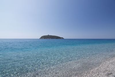 Scenic view of sea against clear sky