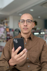 Young man using mobile phone