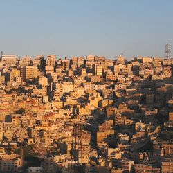 High angle view of buildings against clear sky