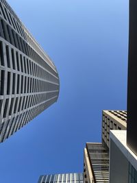 Low angle view of modern building against clear sky