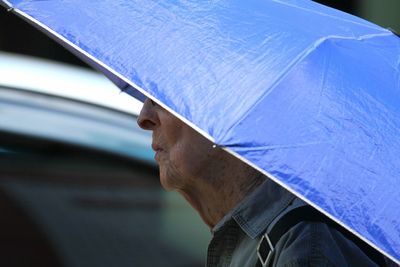 Close-up of man in city