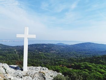 Cross against sky