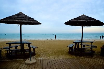 Scenic view of beach against sky