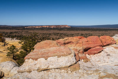 Landscape of large colorful rock formations atop el morro national monument in new mexico