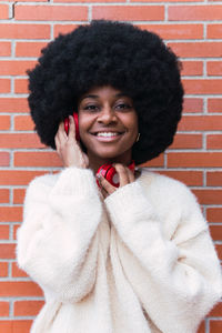 Portrait of young woman with curly hair