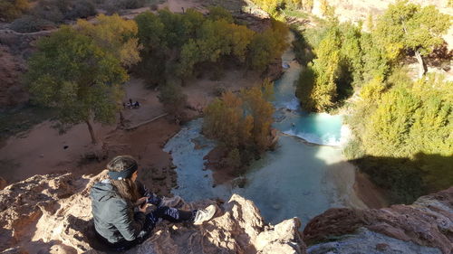 High angle view of man by lake