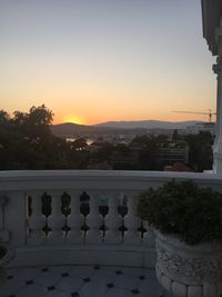 Built structure against sky at sunset